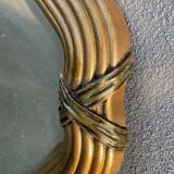 Miroir doré contour ligné