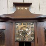 Art Nouveau mahogany buffet with clock in the style of G. Serrurier Bovy.