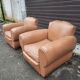 Pair of club chairs in skai