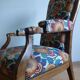 Voltaire armchair with a rack, wheels, and a toad chair in matching fabric.