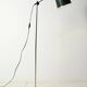 Brass floor lamp with green leather