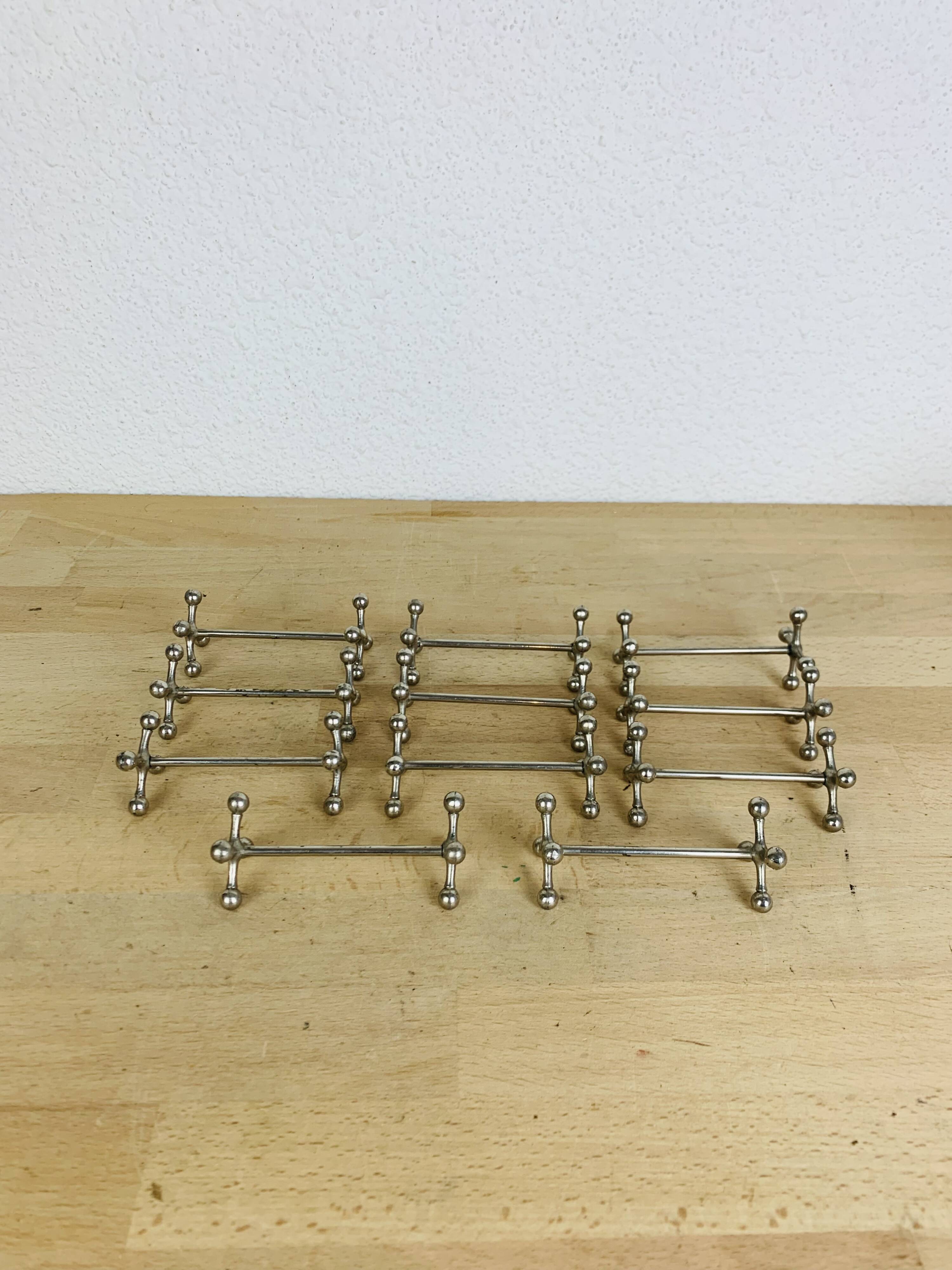 11 vintage metal knife holders
