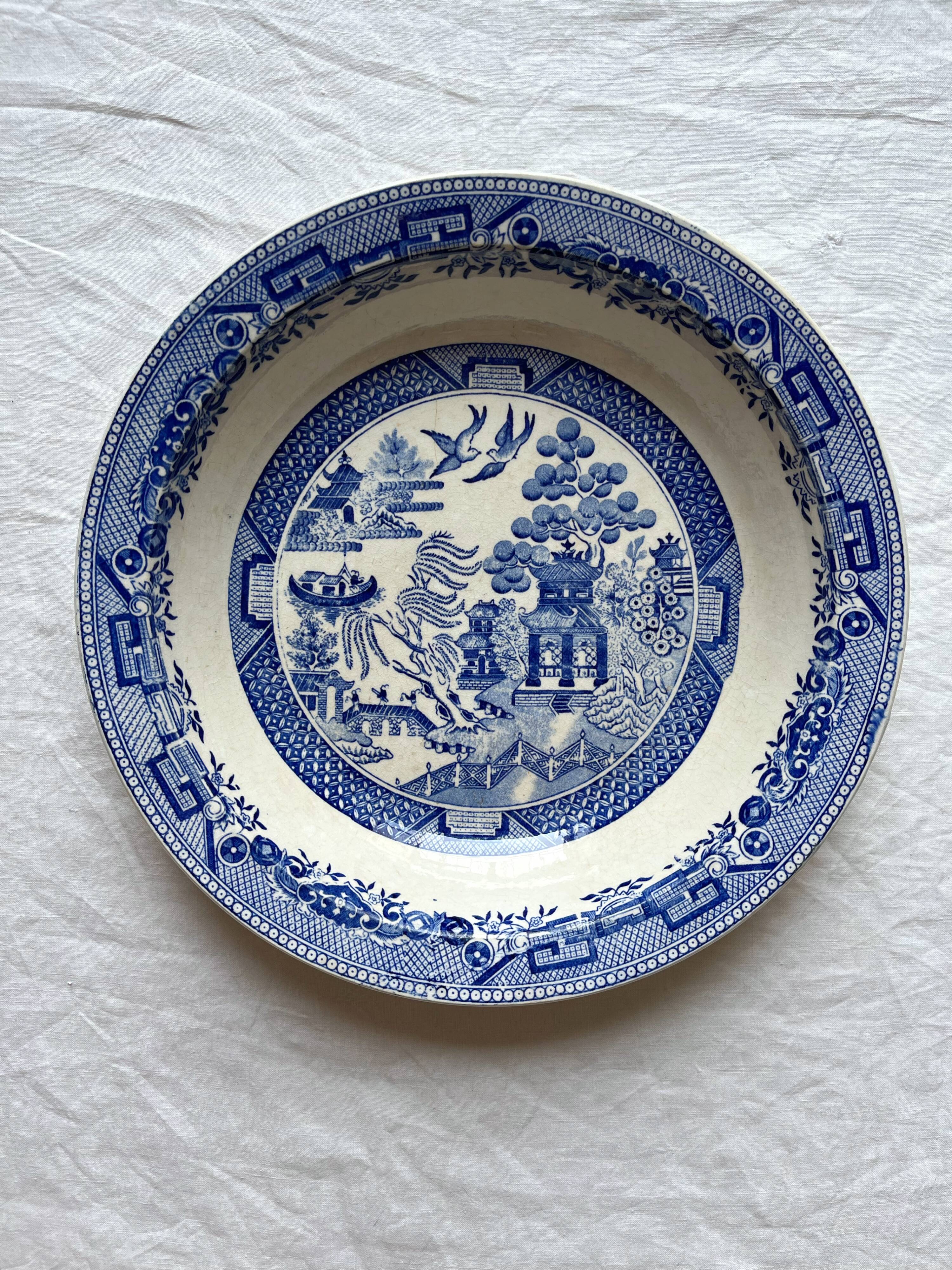 Hollow ironstone dish with blue Japanese decor