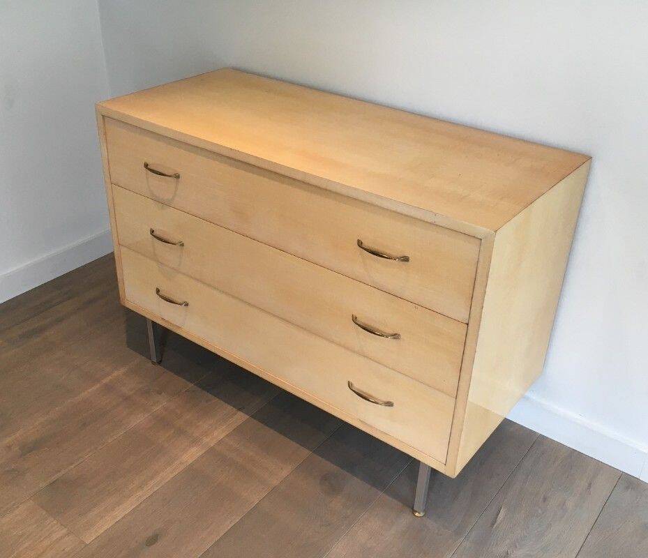 Eggshell lacquered chest of drawers with brushed steel legs. In the style of Knoll.