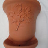 Pair of decorated terracotta wall flower pots