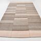 Tapis kilim vintage tons bruns et beige rosé, style minimal artisanal