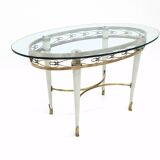Table basse en laiton avec plateau en verre ovale dans le style de Pierluigi Colli, Italie