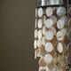 Art Deco table lamp with a mother-of-pearl top and Funkis-style frame.