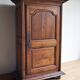 Louis XIII oak wardrobe, bonnetière, 18th century.