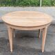 Round extendable dining table stripped in cherry wood Louis XVI René Trotel 1