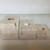 Trio of travertine candlesticks