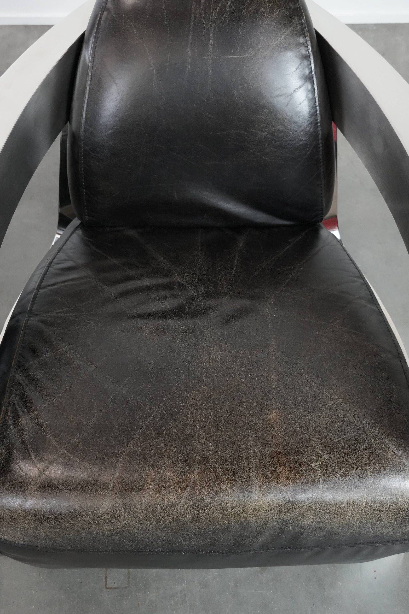 Set of two cowhide leather Aviator design armchairs with aluminium