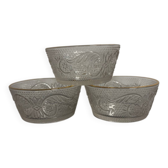 Set of 3 glass bowls with gold embellishments.