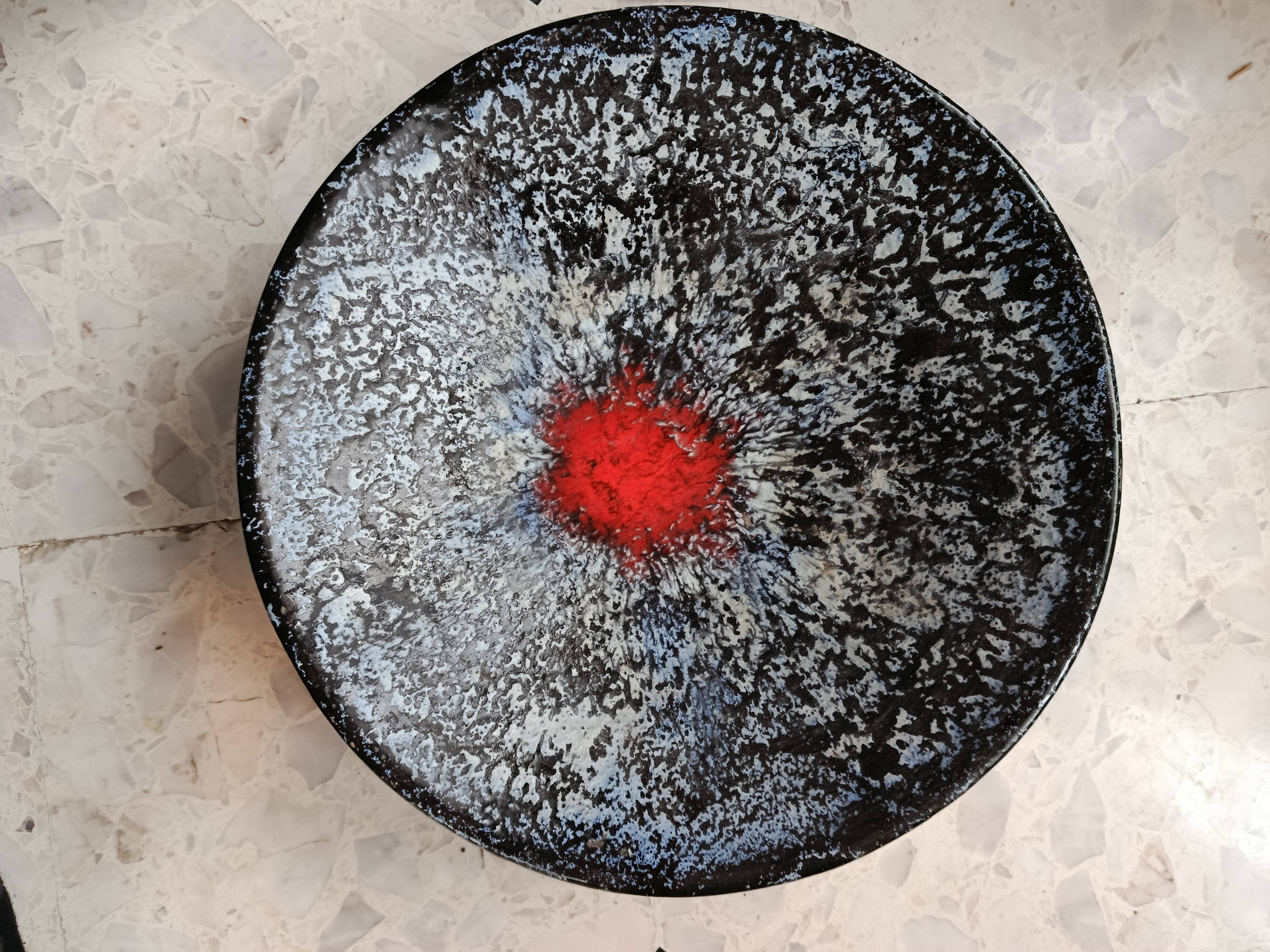 Large stoneware platter signed c. pitot, mid-20th century, black, white, and red glazed ceramic