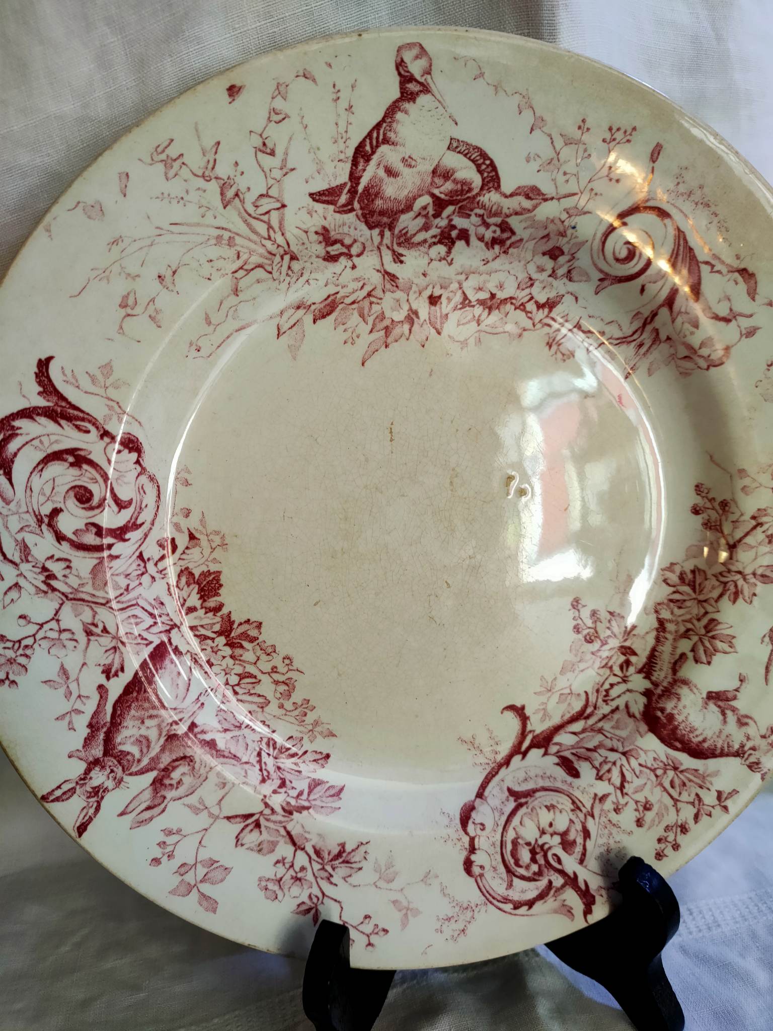 Assiette plate terre de fer faïence de Lunéville K/G