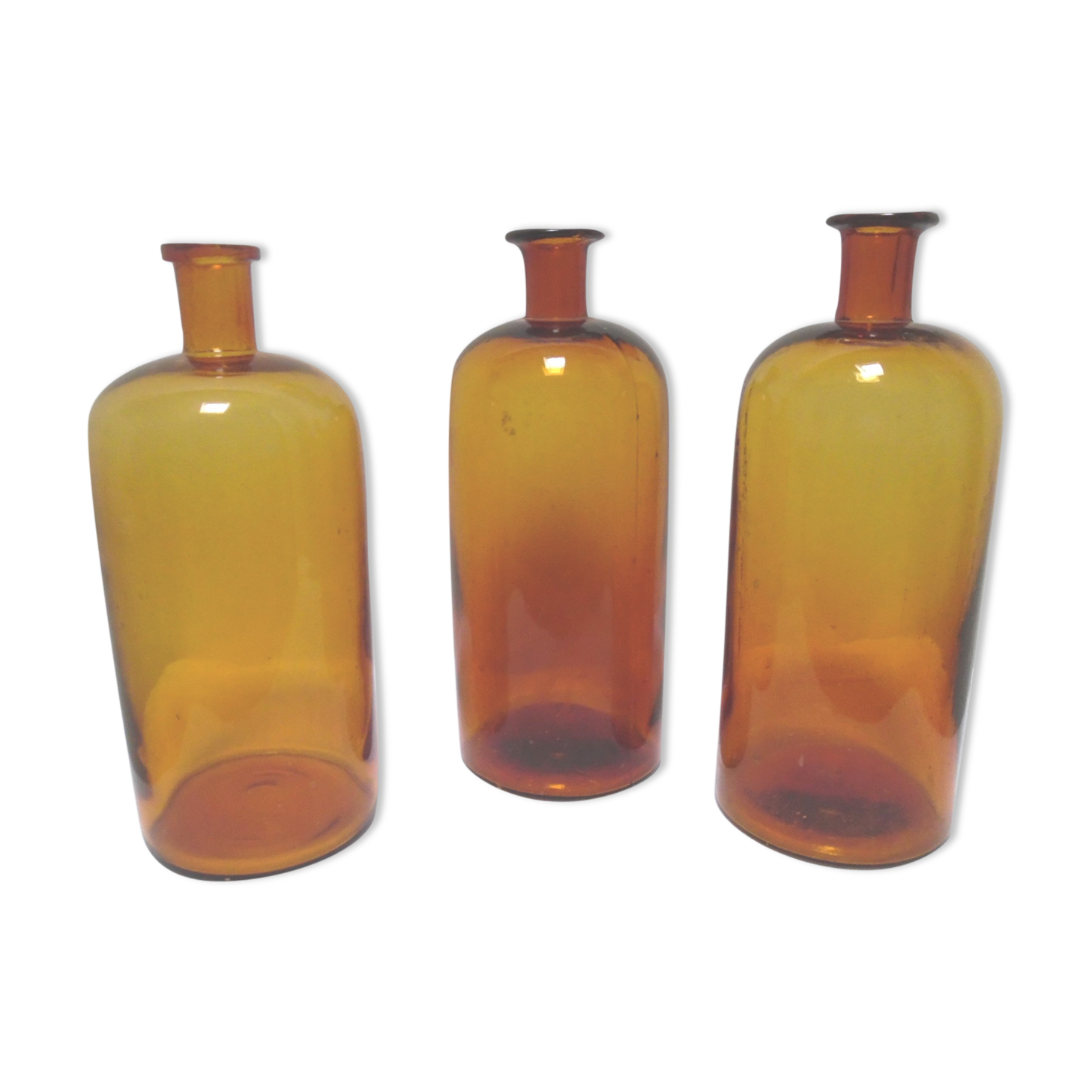 Trio pharmacy bottles