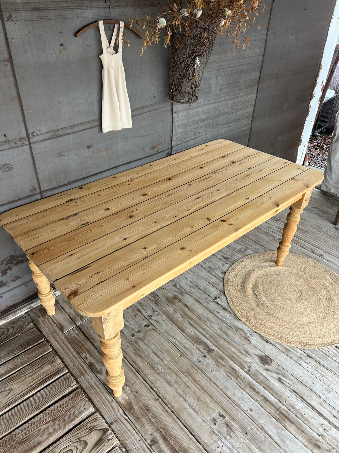 Old farmhouse table in raw wood