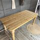 Old farmhouse table in raw wood