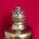 Vintage brass oil lantern with decorative base and transparent glass funnel stamped L B Brand Delay 4399.