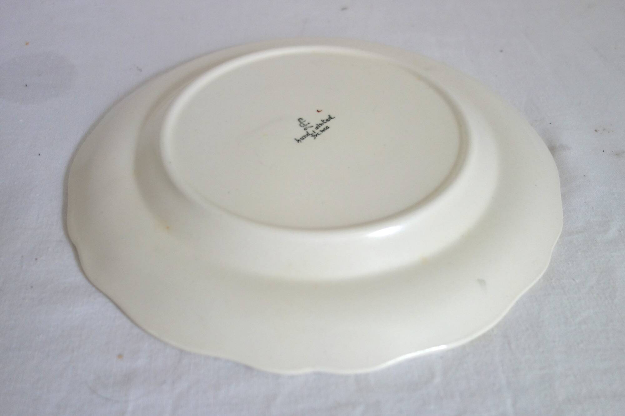 12 anciennes assiettes à dessert Longchamp décor fleuri