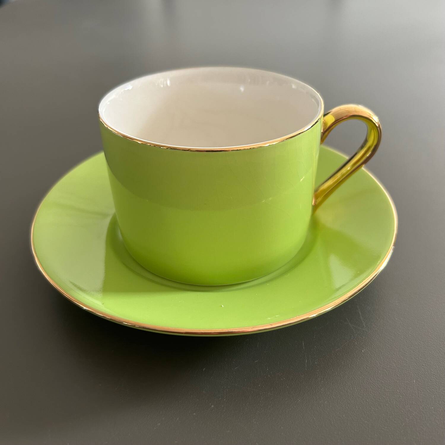 Lime green cup and saucer