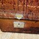 Large Gustave Keller leather trunk with multiple compartments