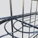 Old wrought iron garden shelf for plants