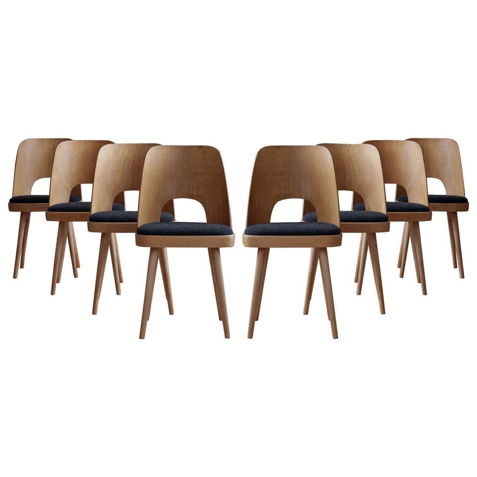Set of 8 dining chairs by oswald haerdtl, reupholstered, midcentury