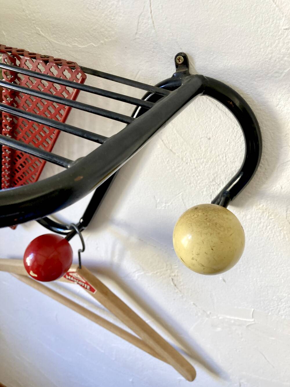 Wall coat rack, 1950s, attributed to Mathieu Matégot.