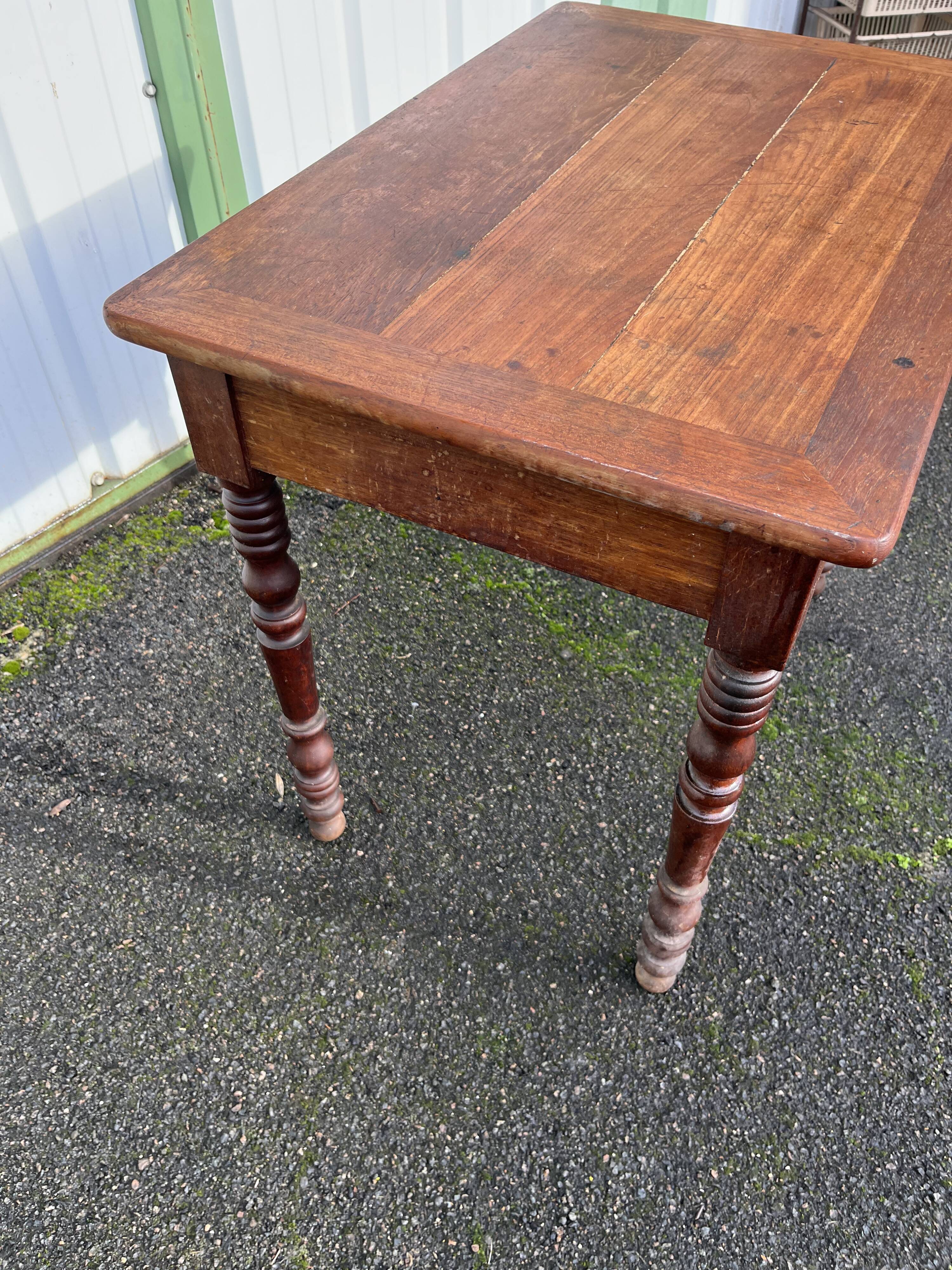 Wooden side table with turned legs