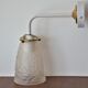 White and gold art deco wall lamp