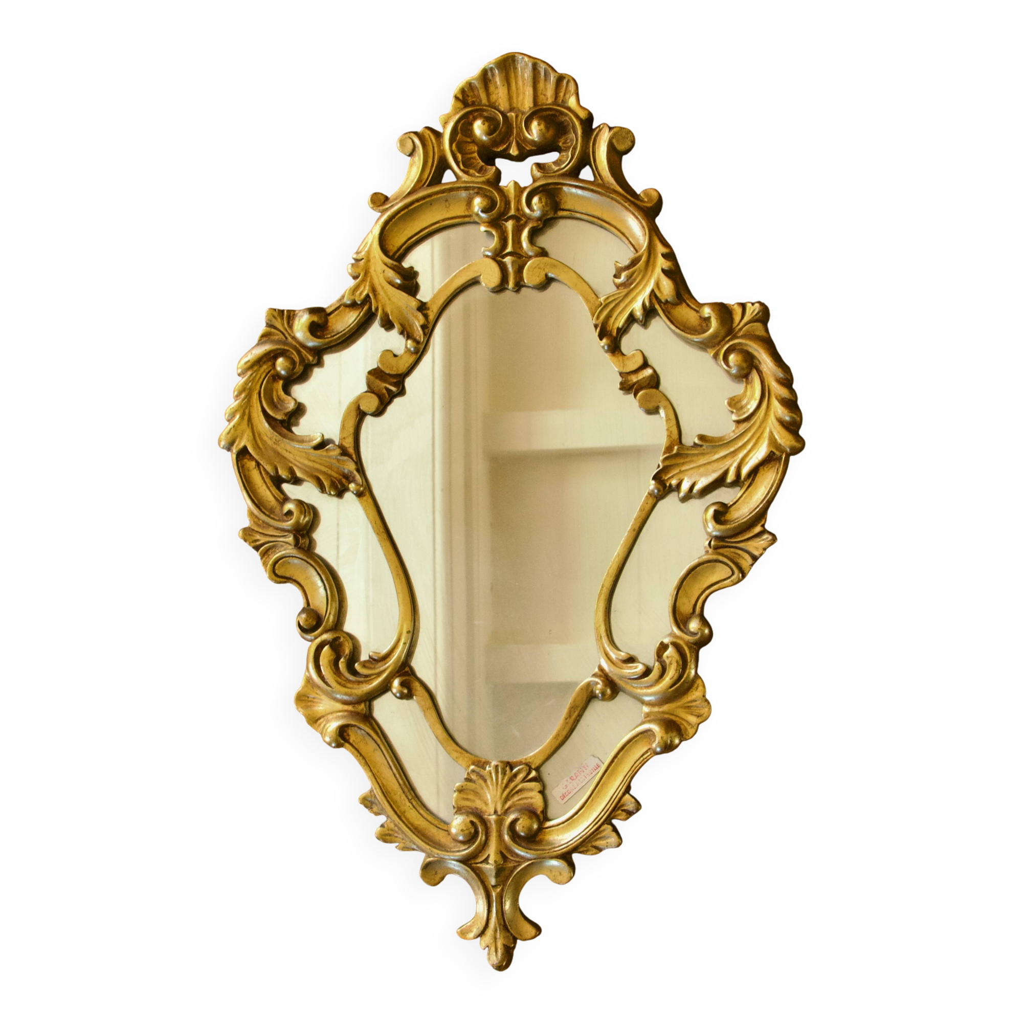 Antique Baroque mirror with gilded metal panels
