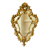 Antique Baroque mirror with gilded metal panels