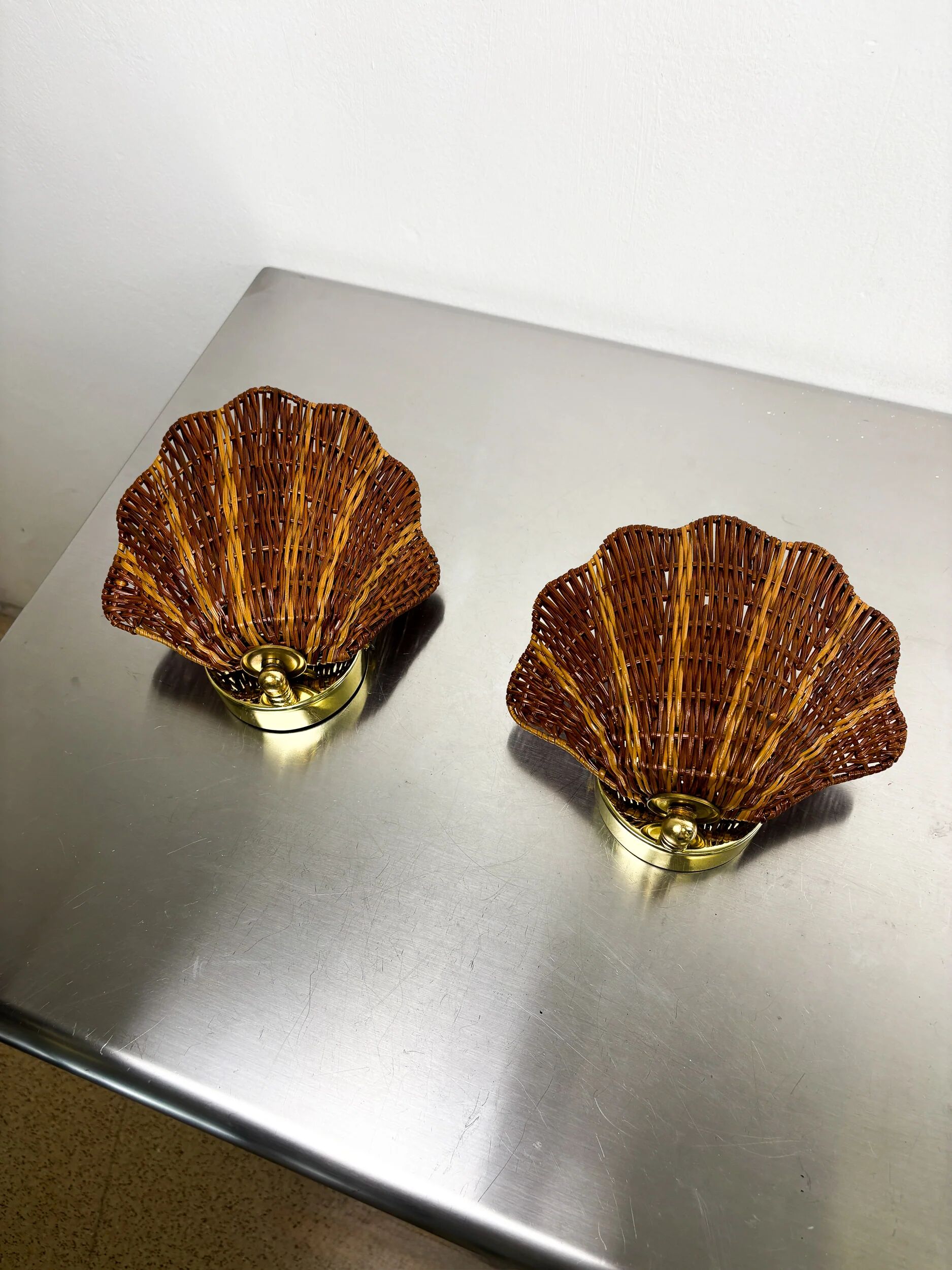Pair of shell-shaped wicker wall sconces – rattan & brass, circa Italy 1970