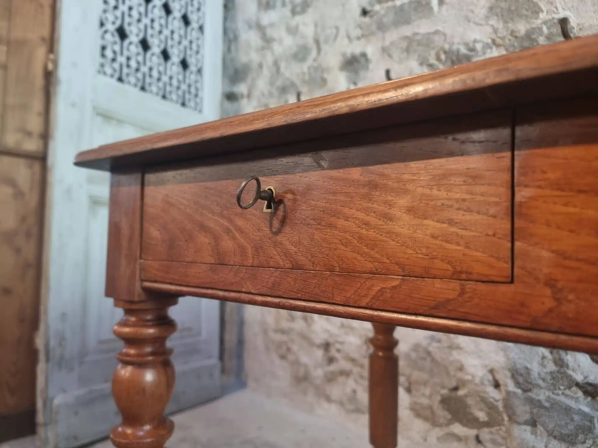 Antique French oak writing desk with 2 lockable drawers, circa 1920.