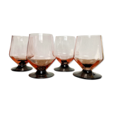 4 pink glasses with black stems