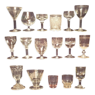 Set of 17 mismatched shot glasses