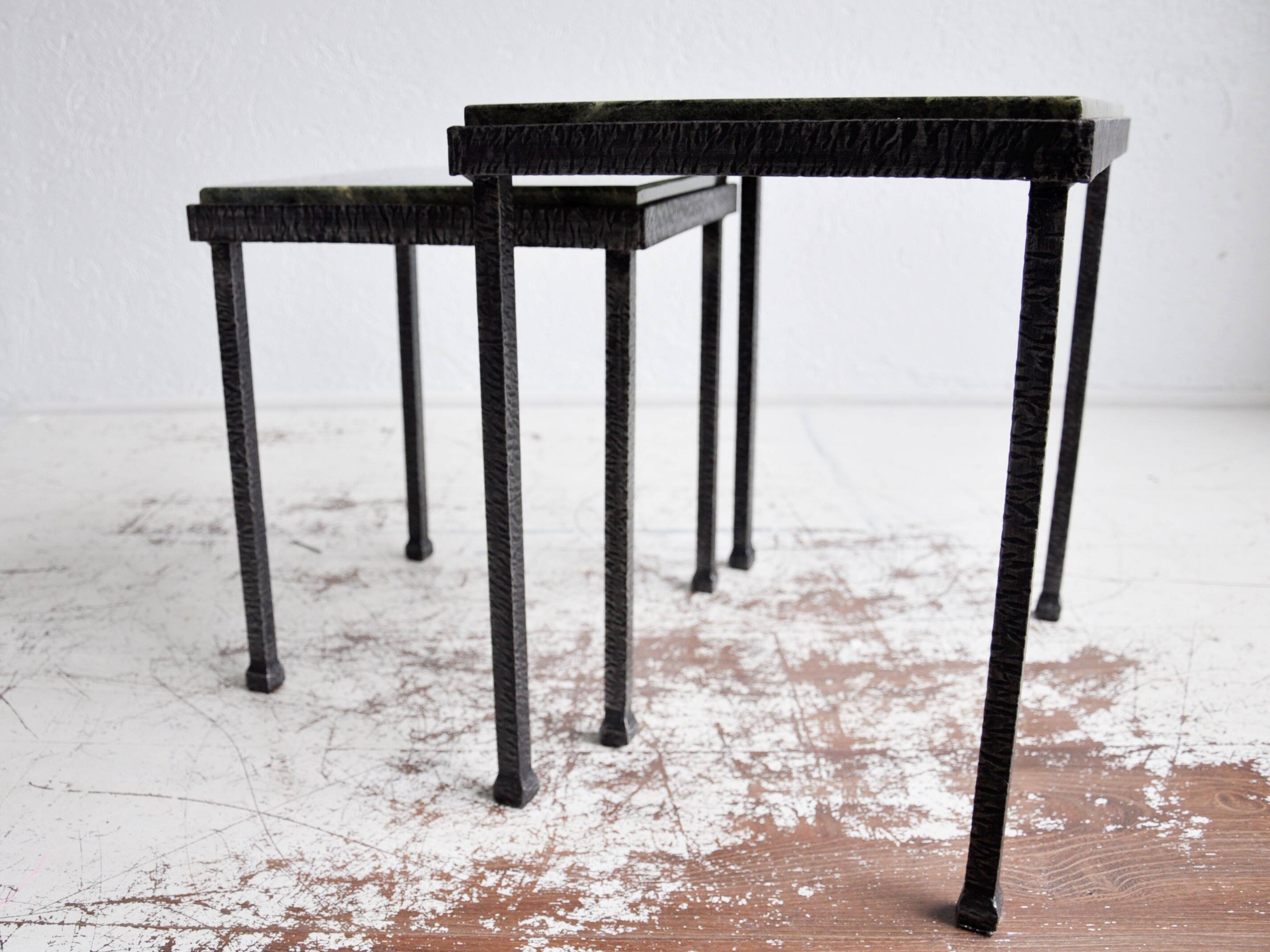 Green nesting coffee table with marble top and iron frame