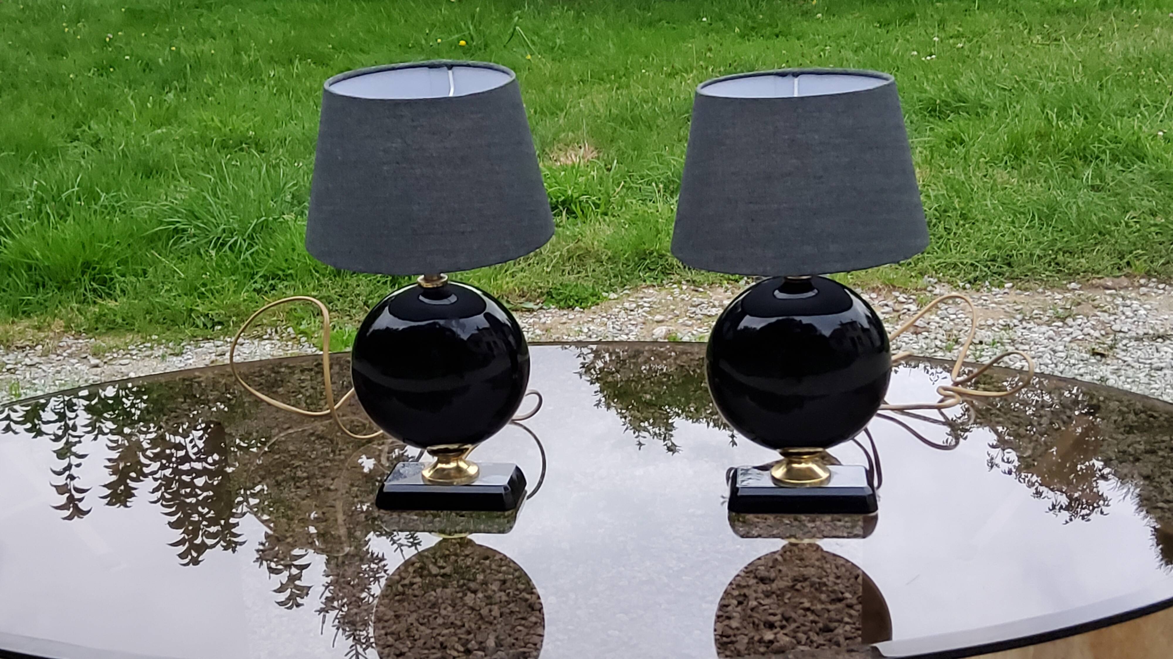 Pair of 70s designer lamps in black ceramic and gold metal