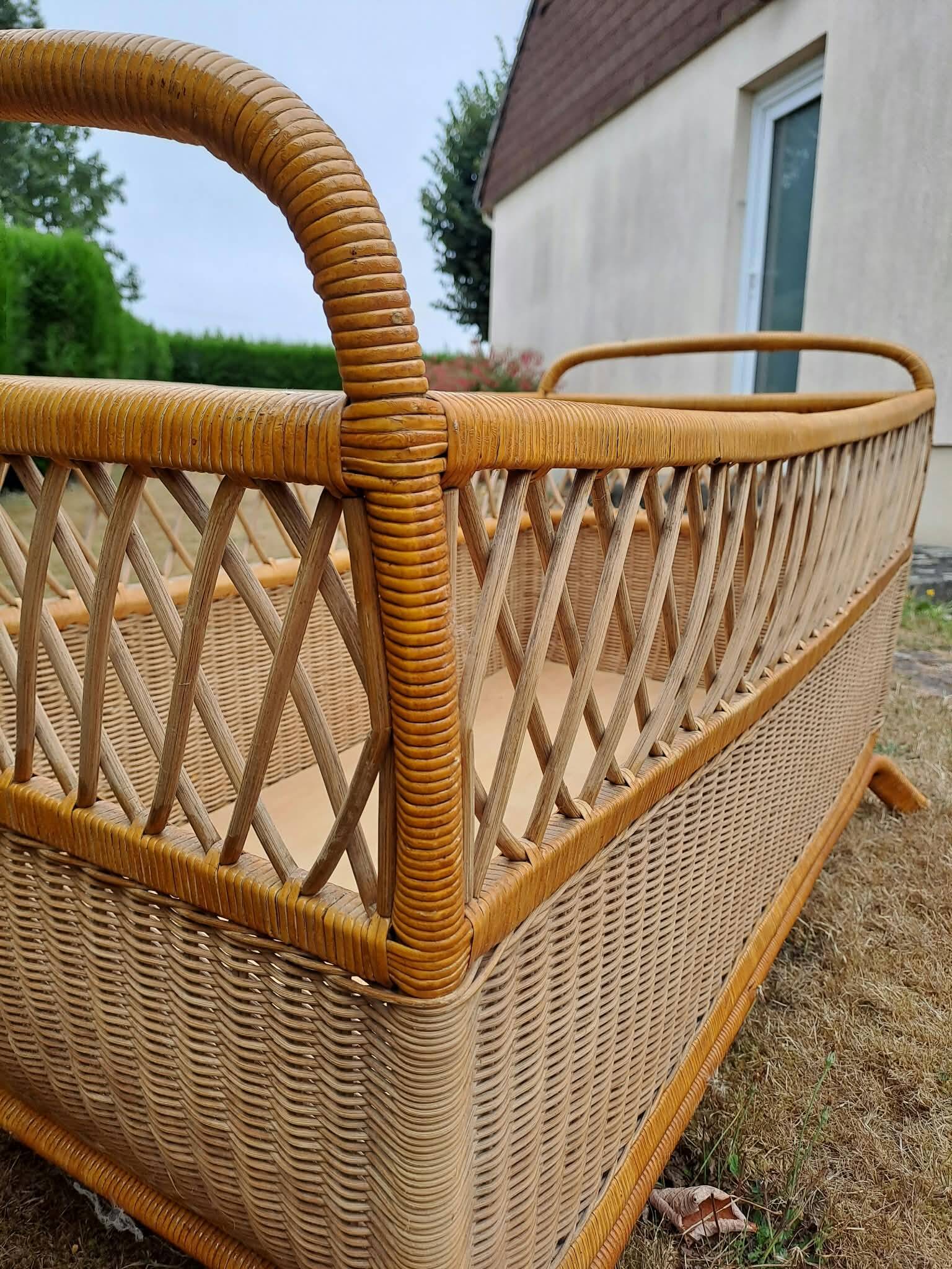 Rattan cradle.