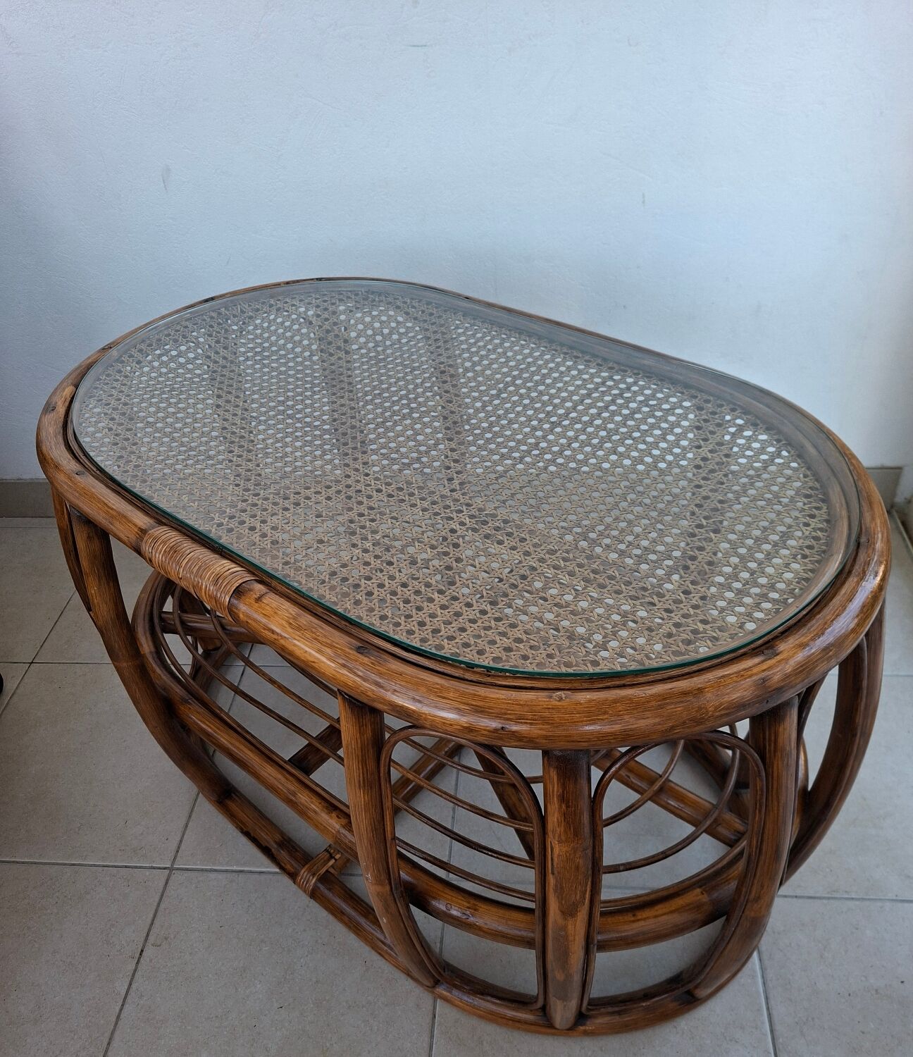 Oval coffee table in rattan and cane, vintage double top.