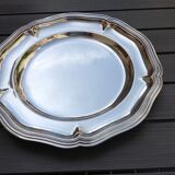 Silver metal dish with twisted edges
