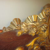 Old wooden pediment stucco