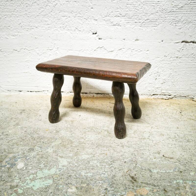 Turned wooden footrest