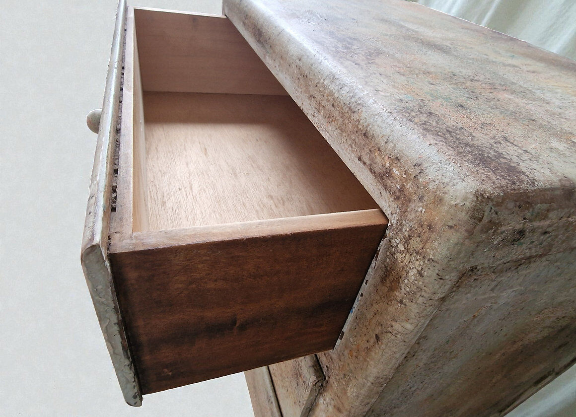 Small chest of drawers with pigments