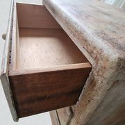 Small chest of drawers with pigments