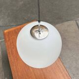 Minimalist suspended glass ball lamp from the vintage German space age by Glashütte Limburg, 1970s.