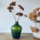 Green carved glass vase