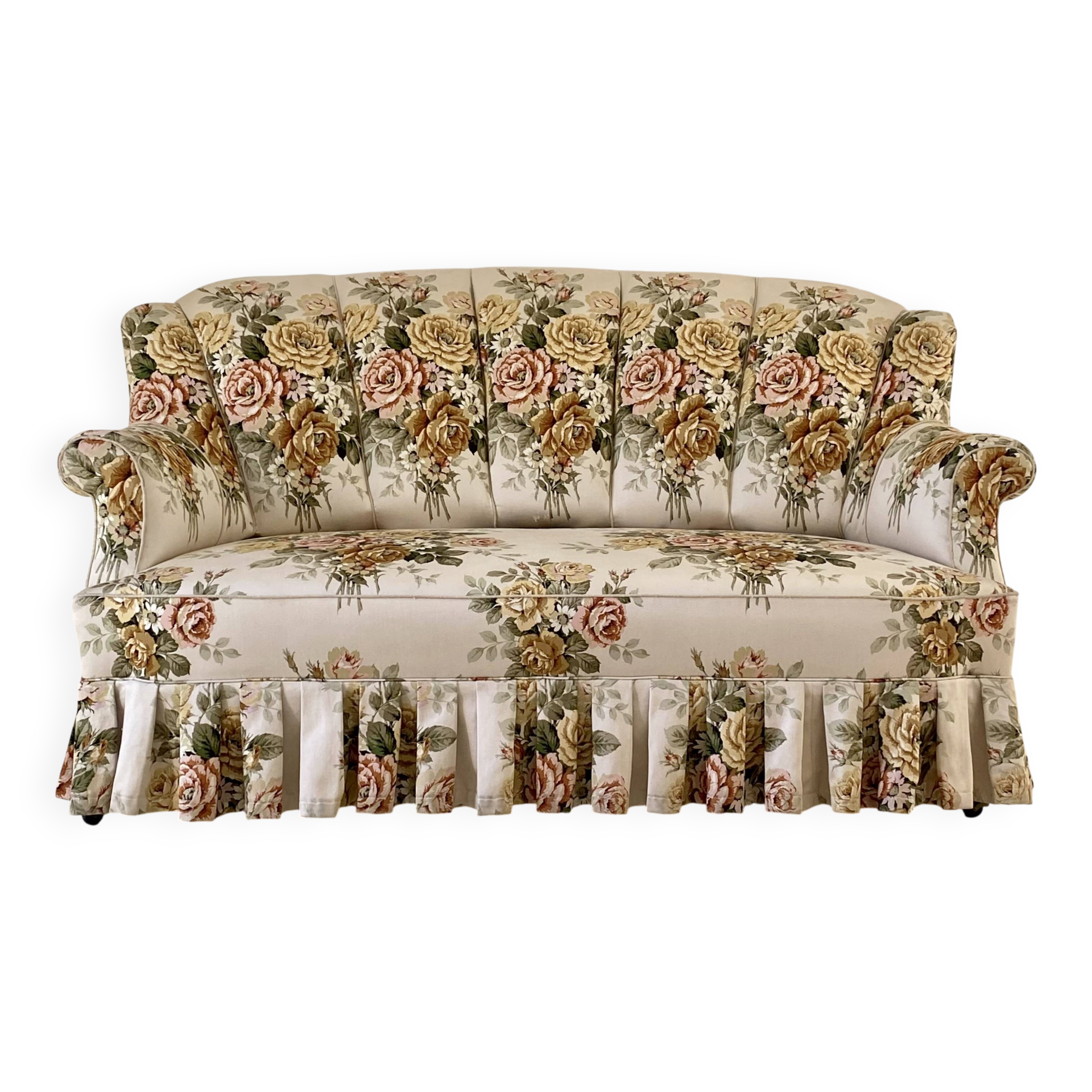 Napoleon III floral toad sofa with boudoir spirit and sliced backrest.