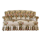 Napoleon III floral toad canapé with boudoir spirit and sliced backrest.